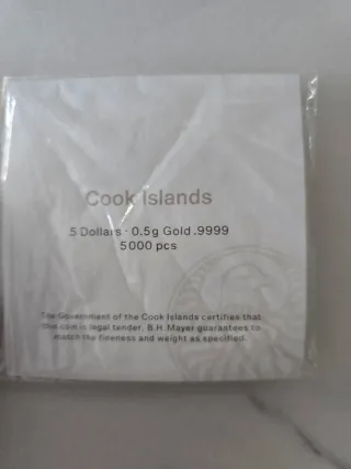 Moneta d'oro 0,5g con delfini