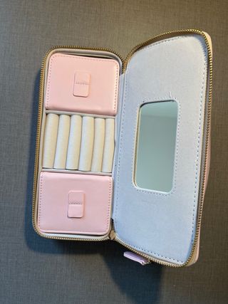 Joyero de viaje rosa y dorado