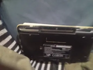 Nintendo DS para piezas + cargador y boli