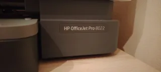 Impresora Multifunción HP gris y blanca