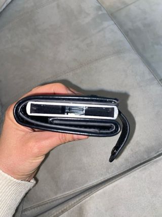 Portafoglio uomo con meccanismo a scomparsa