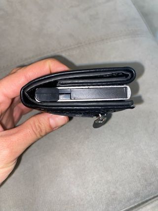 Portafoglio uomo con meccanismo a scomparsa