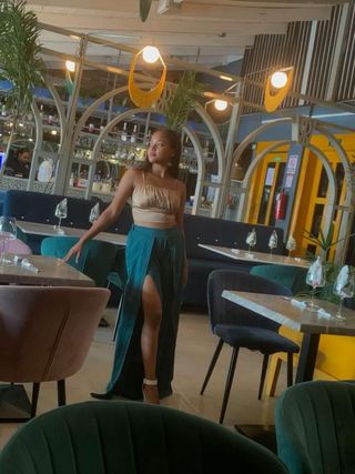 Elegante pantalón palazzo verde