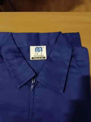 4 Cazadora de trabajo azul A 2€/ unidad..