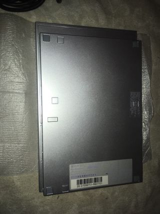 PS2 Silver Slim in condizioni perfette, mai usata, per collezionisti