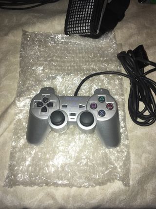 PS2 Silver Slim in condizioni perfette, mai usata, per collezionisti
