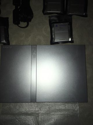 PS2 Silver Slim in condizioni perfette, mai usata, per collezionisti