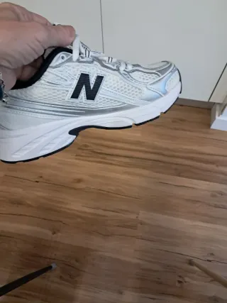 New balance 740 blancas con detalles plateados