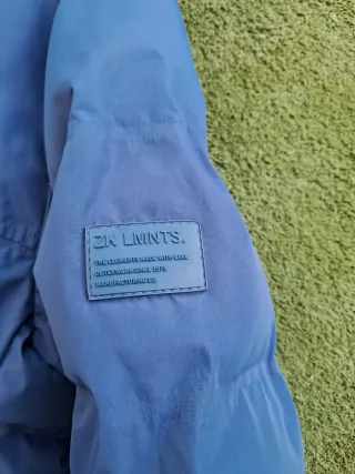 Abrigo acolchado azul marino