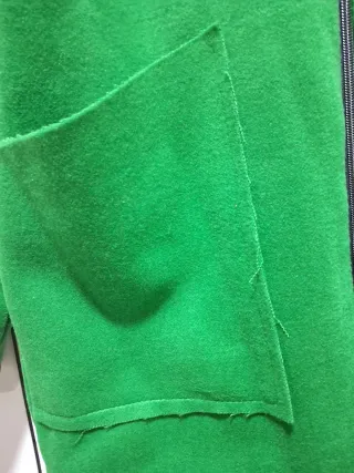Cappottino con cappuccio verde