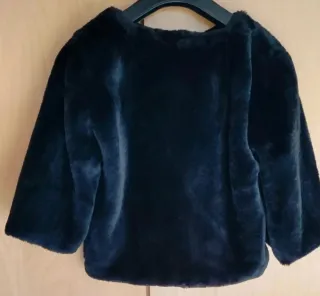 Giacca corta in pelliccia sintetica nera