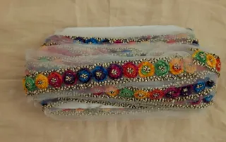 Pasamanería de flores multicolor