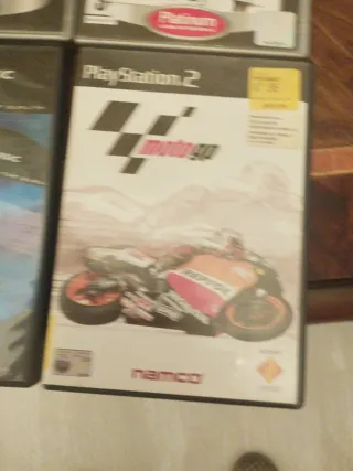 4 Juegos PS2: MotoGP 4, FIFA 09, MotoGP, DVD Clean