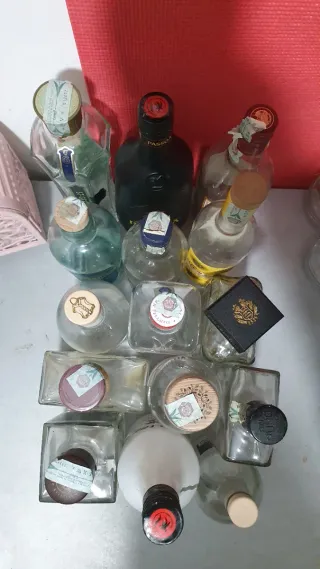 15 bottiglie vuote miste