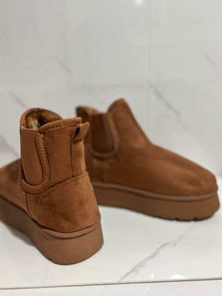 Stivaletti marroni con pelo