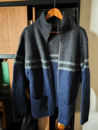 Jersey de punto con cremallera y bolsillos