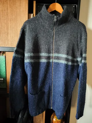 Jersey de punto con cremallera y bolsillos