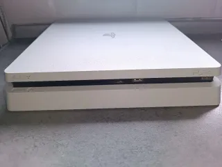 PS4 Slim 1TB Bianca + Controller Blu + Giochi