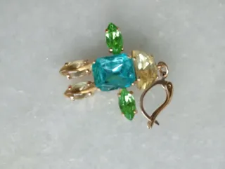 Orecchini omino metallo cristalli colorati