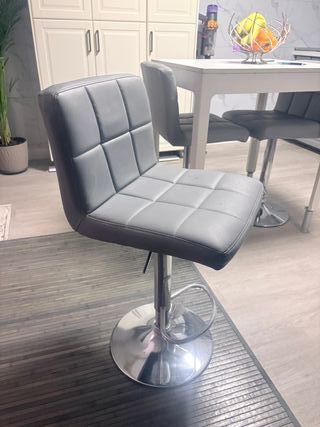 Taburetes hidráulicos grises (4 unidades)