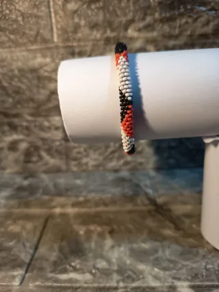 Bracciale perline nero, arancio, bianco