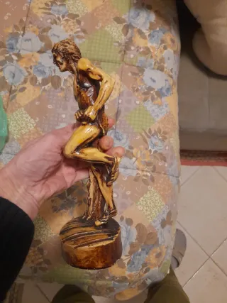 Statua in legno corridore