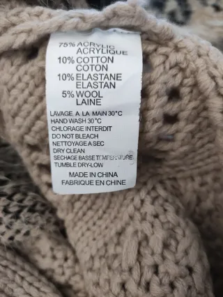 Chaleco de punto beige y negro