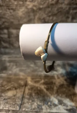 Bracciale con pietre bianche e oro