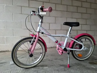 Bicicleta infantil Btwin rosa y blanca
