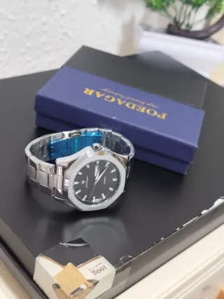 Reloj Poedagar Negro y Plateado