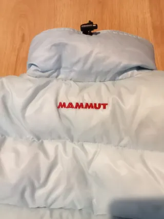 Plumas Mammut azul mujer.