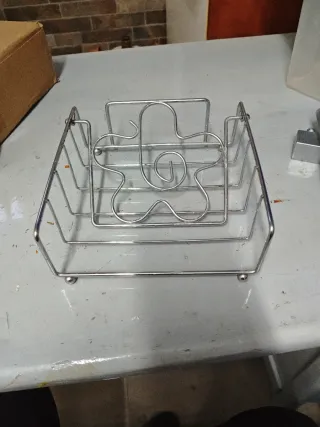 Servilletero cromado con diseño de flor