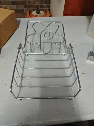 Servilletero cromado con diseño de flor