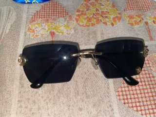 Occhiali da sole Cartier neri e oro