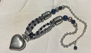 Collana in metallo con cuore argentato