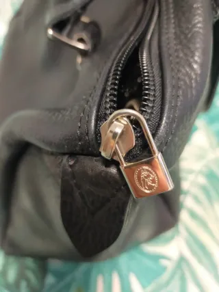 Bolso de piel negro El Potro.