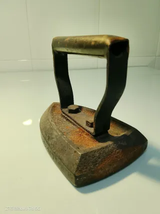 Plancha antigua de hierro