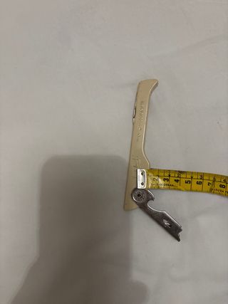 Apribottiglie vintage beige e argento