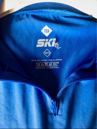 Camiseta nueva de esquí azul 10-12 años
