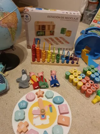 Lote Juguetes Bebé: Mundo y Reloj