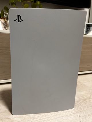 Consola PS5 + Base Carga + 2 Juegos