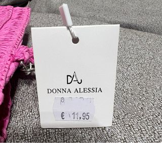 Bolso de mano rosa de rafia