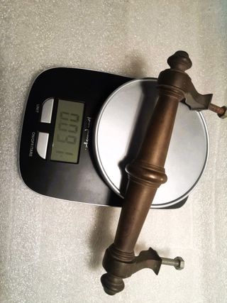 Tirador antiguo de bronce