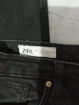 Pantalones vaqueros negros desgastados