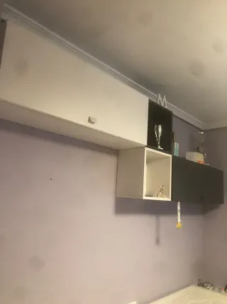 Cama nido gris y blanca