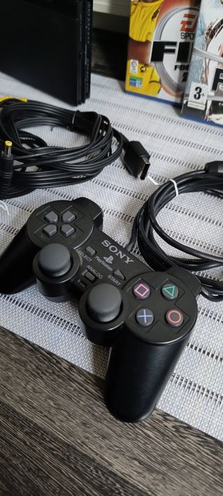 PS2 Slim completa + giochi