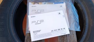 PS2 Slim completa + giochi