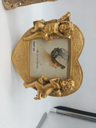 Portafoto oro decorato