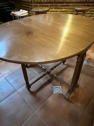 Mesa ovalada nogal extensible