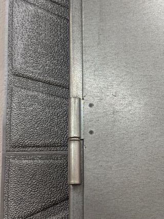 Puerta metálica trastero/local